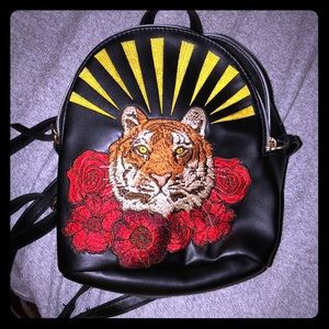 a small little mini backpack